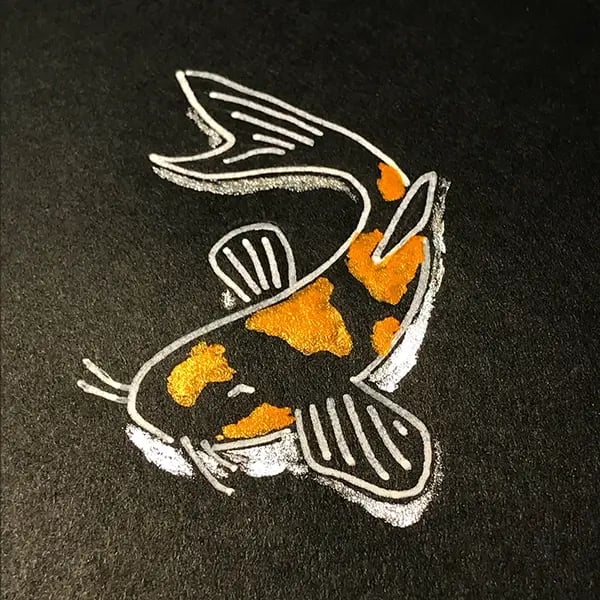 Image of art on black paper
